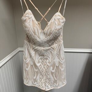 Lulu's beige and white sequined romper